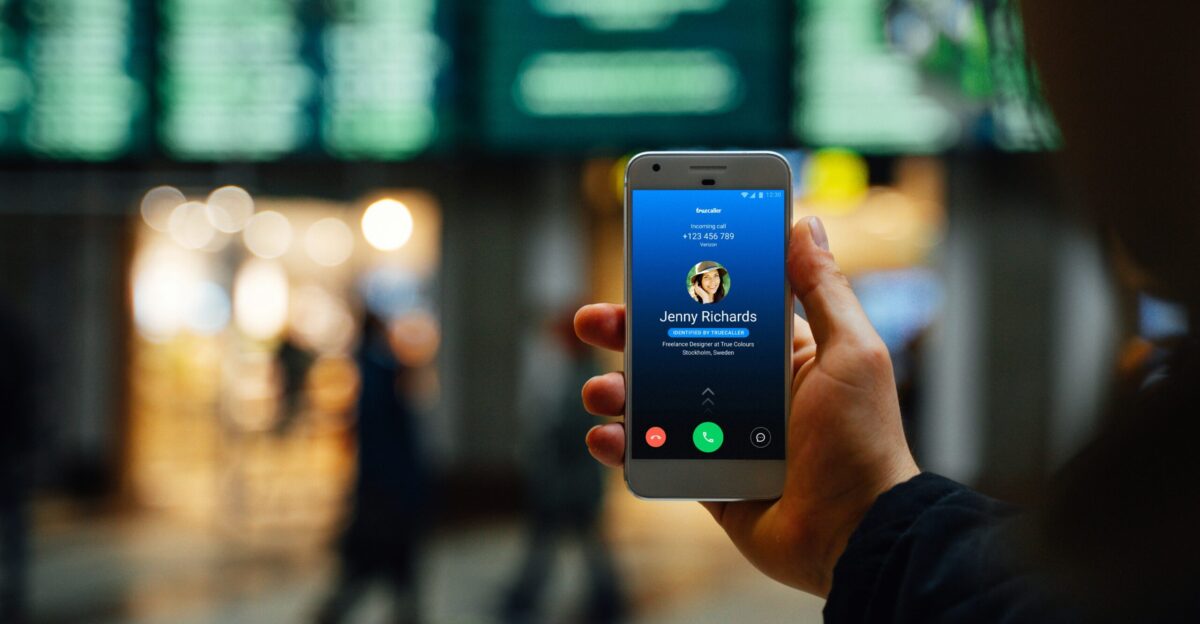 person holding silver iphone 6