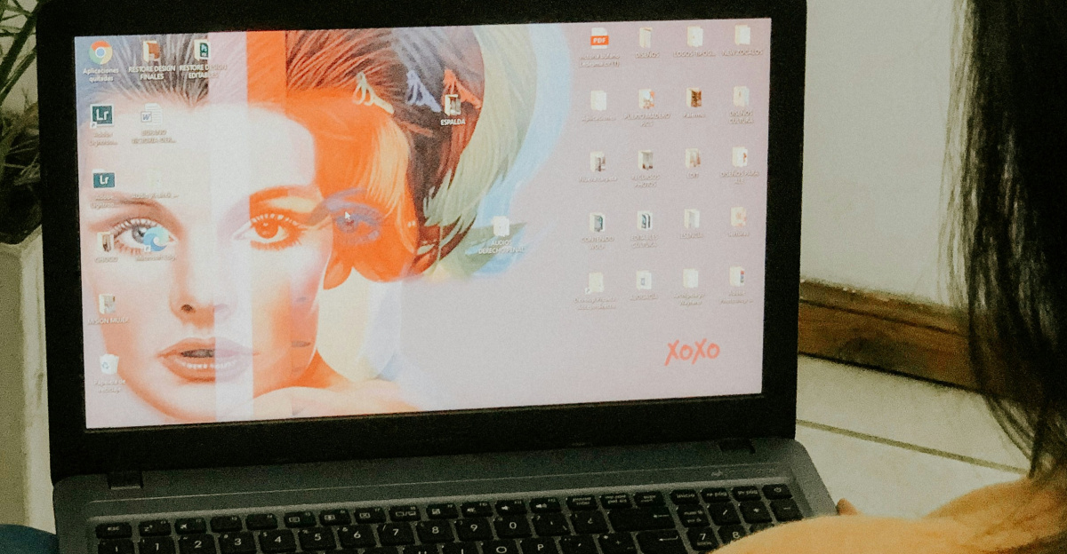 woman in yellow long sleeve shirt using macbook pro