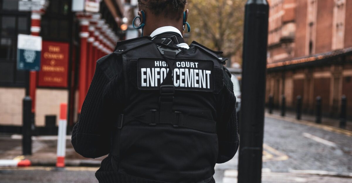 man in black and white adidas jacket wearing black and white headphones