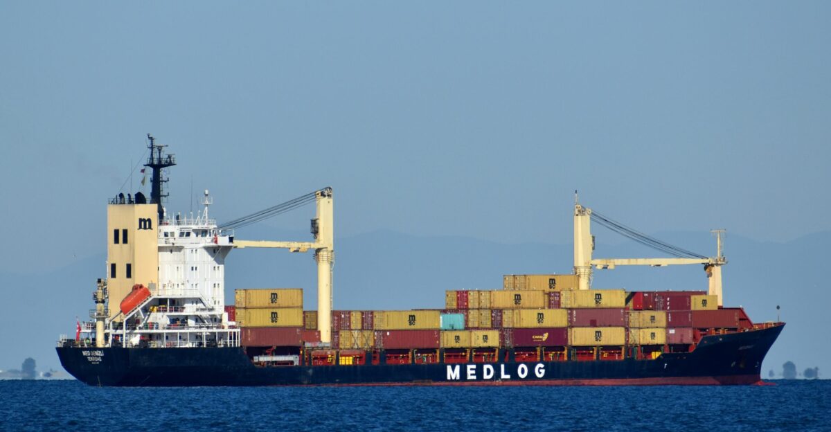cargo ship on sea during daytime