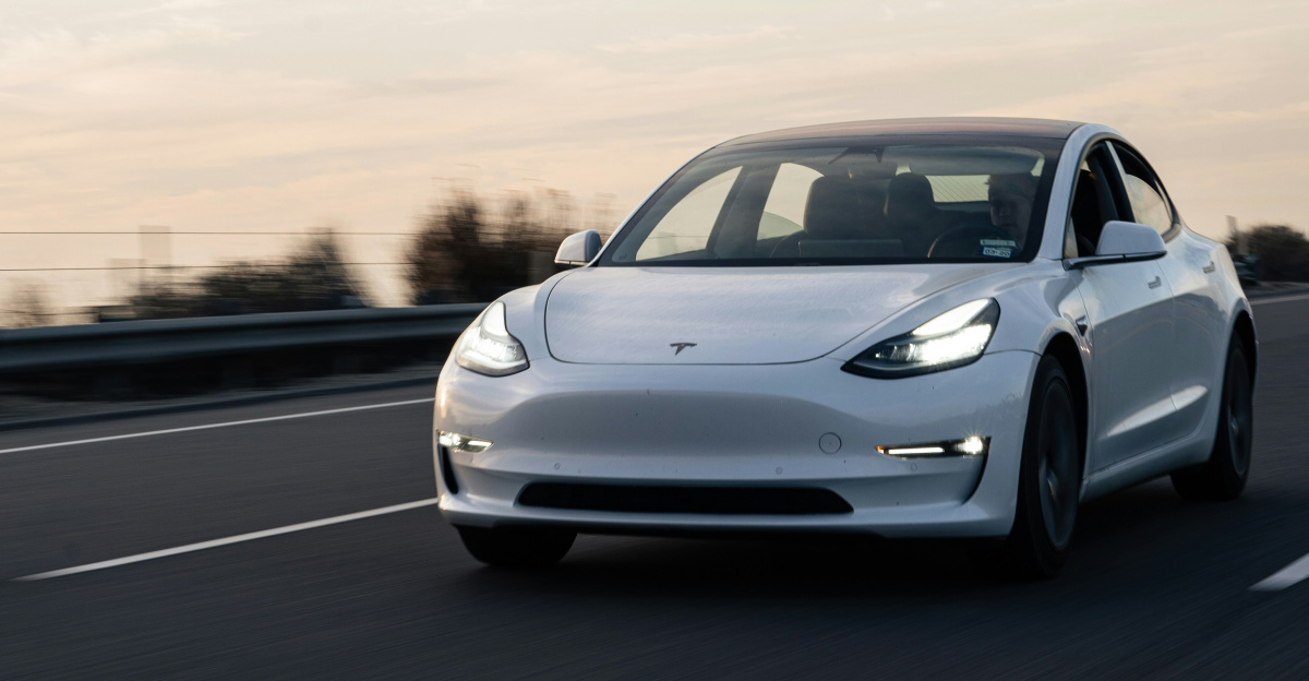 white bmw m 3 on road