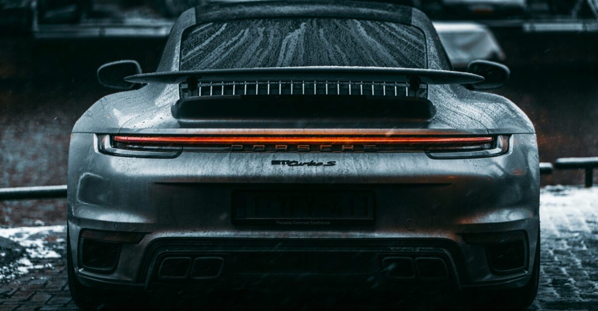 black car in grayscale photography