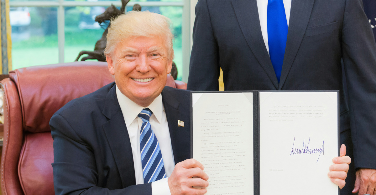 2 men in black suit sitting on red chair