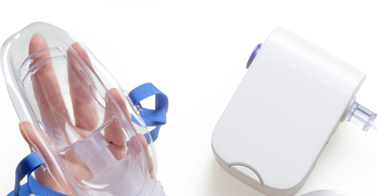 person holding white and blue plastic bottle