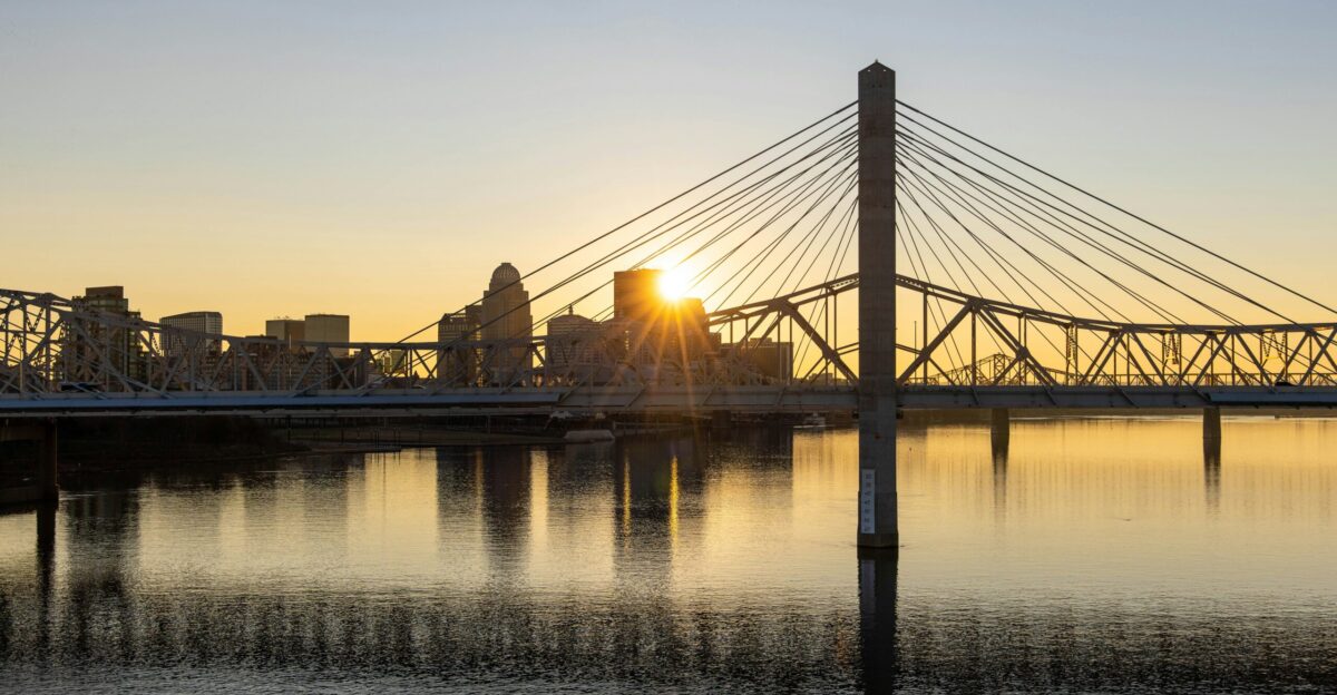 bridge over water during sunset
