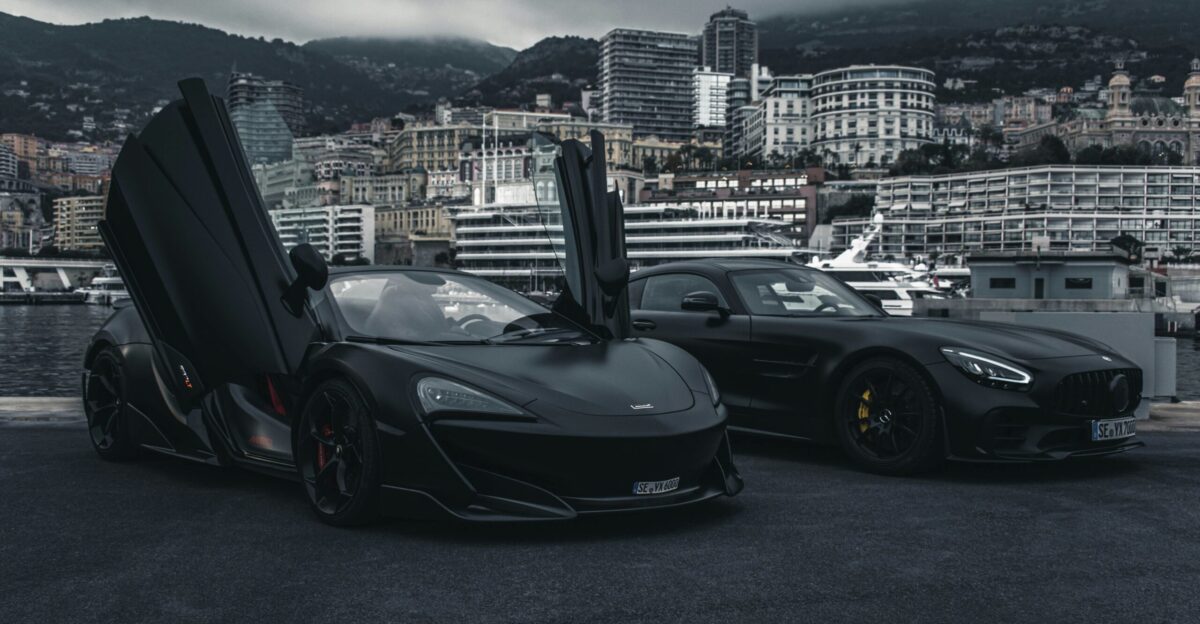 black porsche 911 parked on parking lot