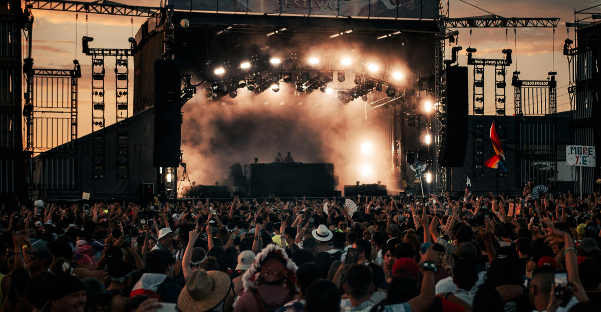 people watching concert during daytime