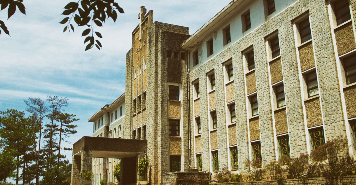 brown concrete building under blue sky during daytime