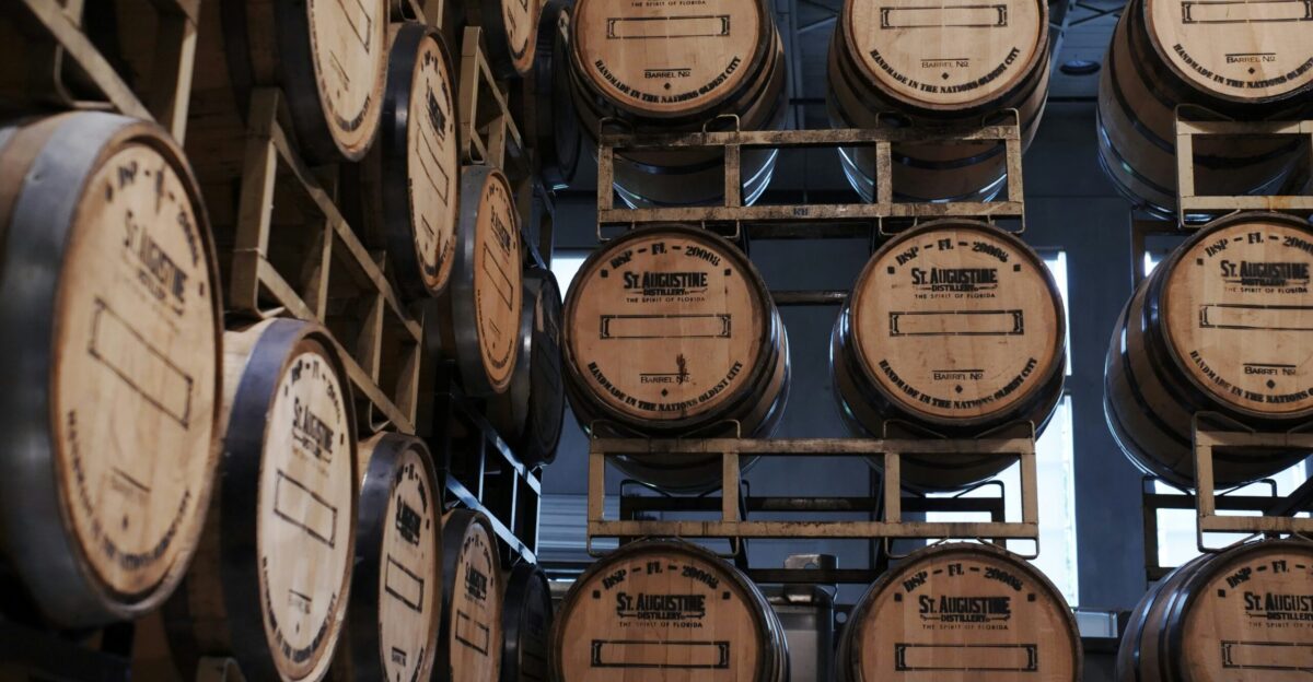 brown wooden barrels on brown wooden shelf