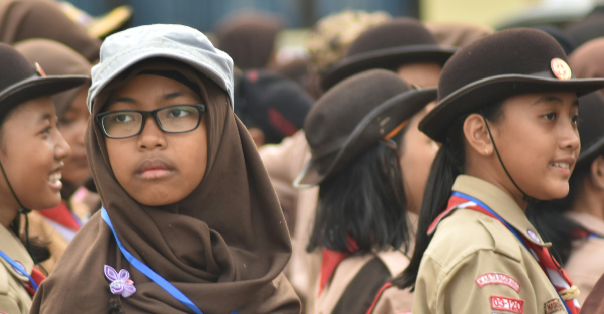 woman in brown and blue hijab