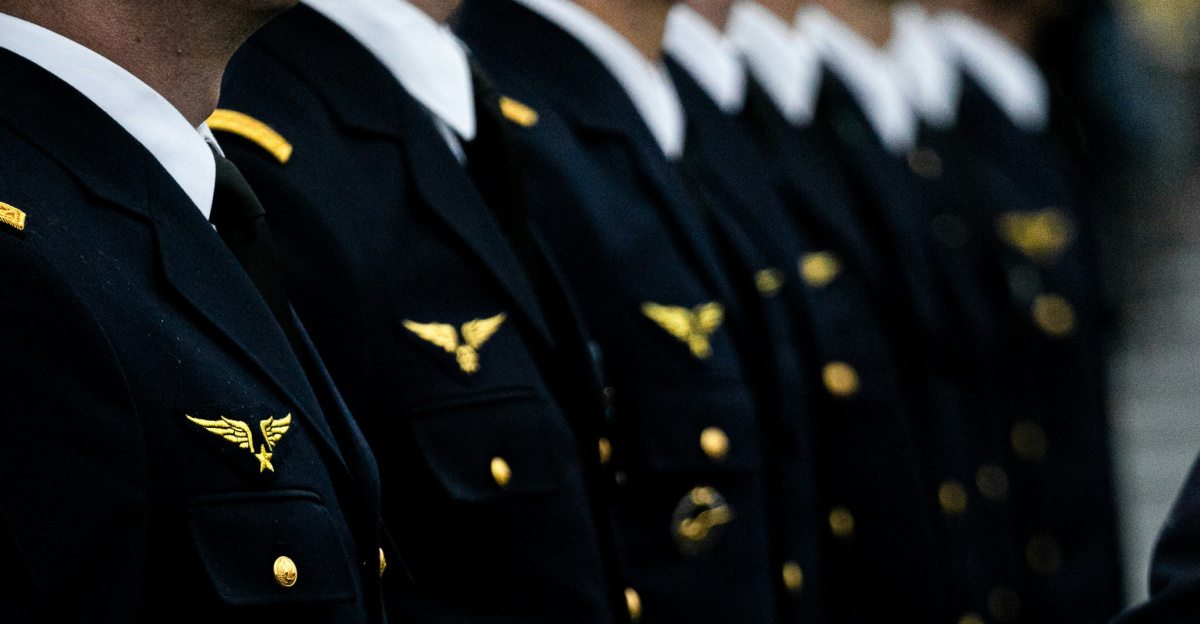 man in black and yellow uniform