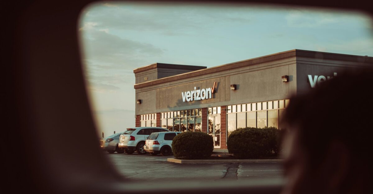 cars parked in front of store during daytime