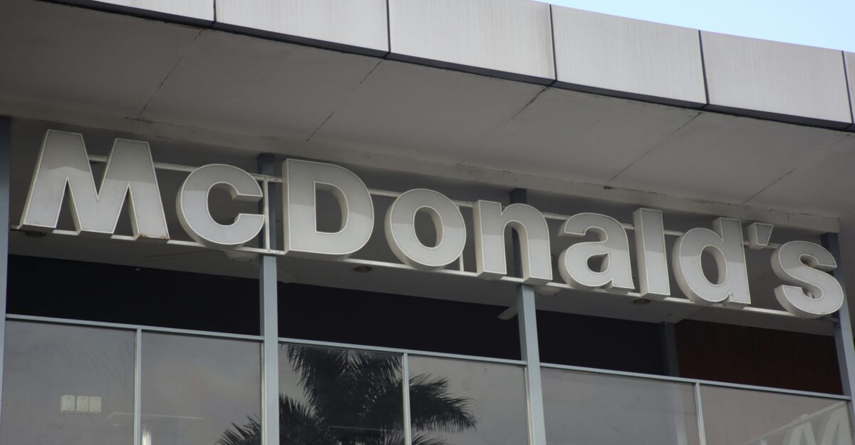 white and black building with glass window