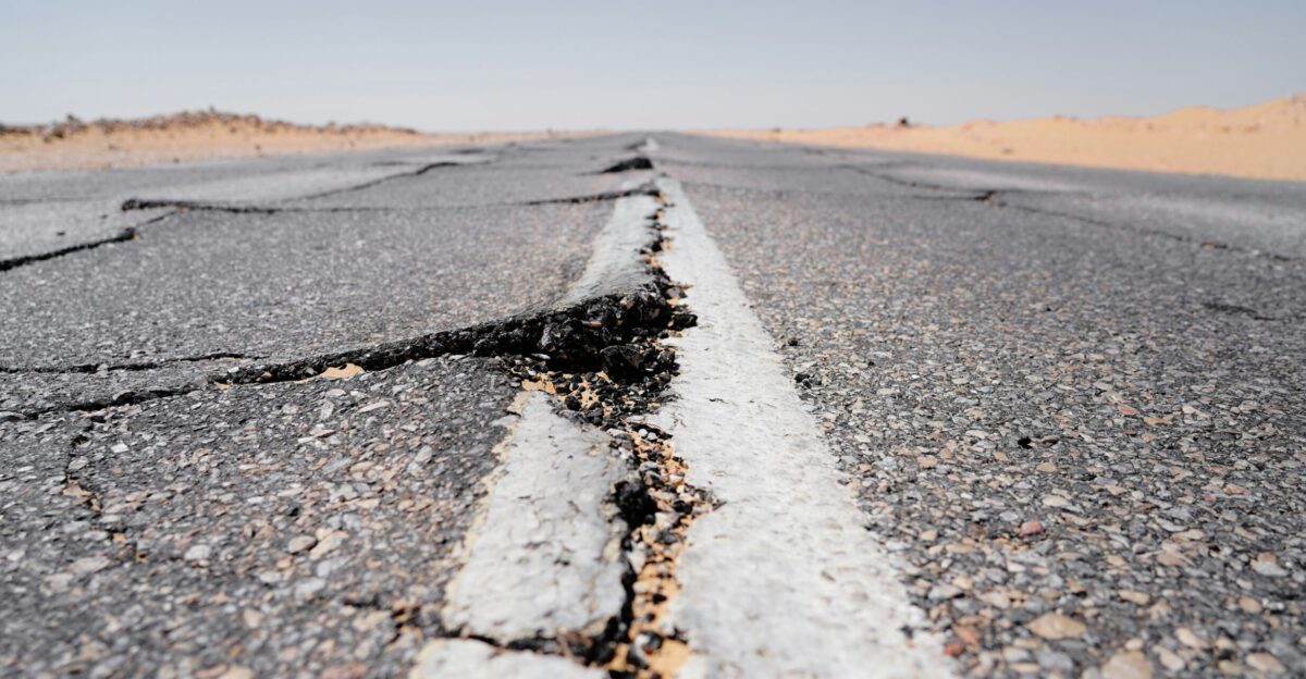 a crack in the middle of a road in the middle of nowhere