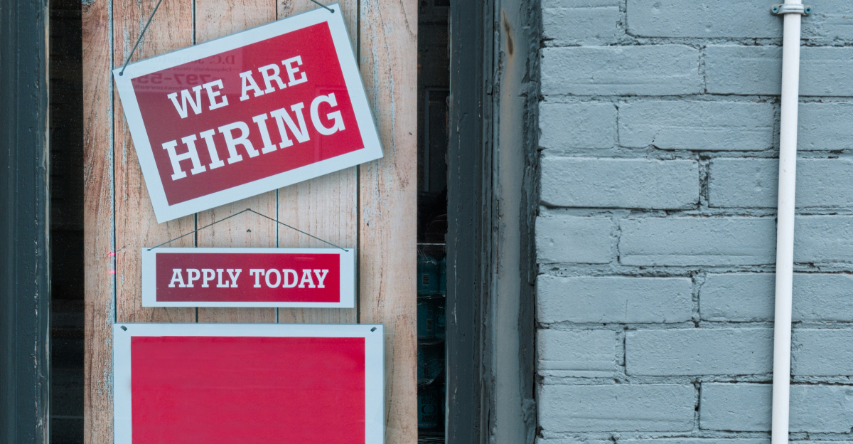 a sign that says we are hiring and apply today