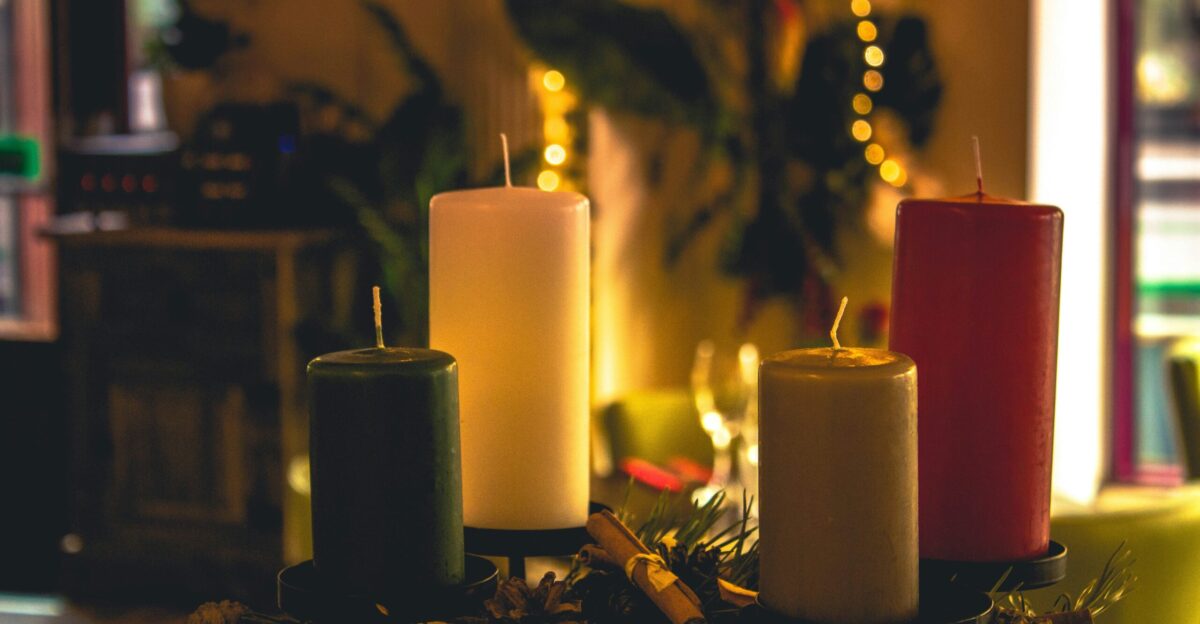 a group of candles sitting on top of a table