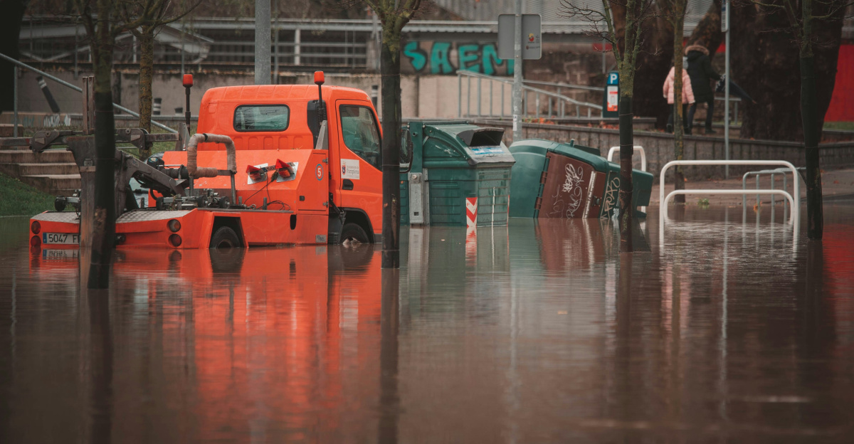 a truck is parked in a flooded street