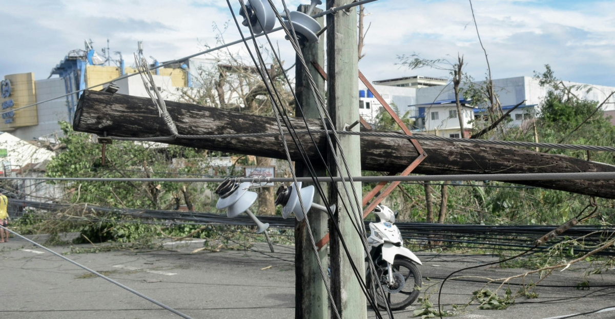 a telephone pole that has been knocked over