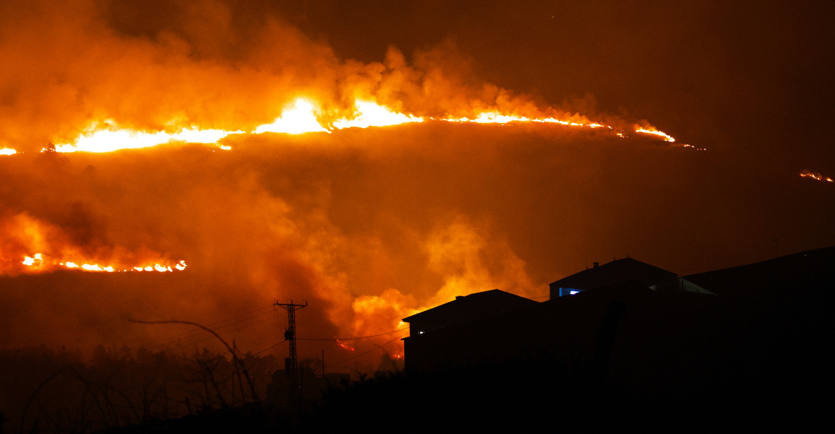a large fire is burning in the sky