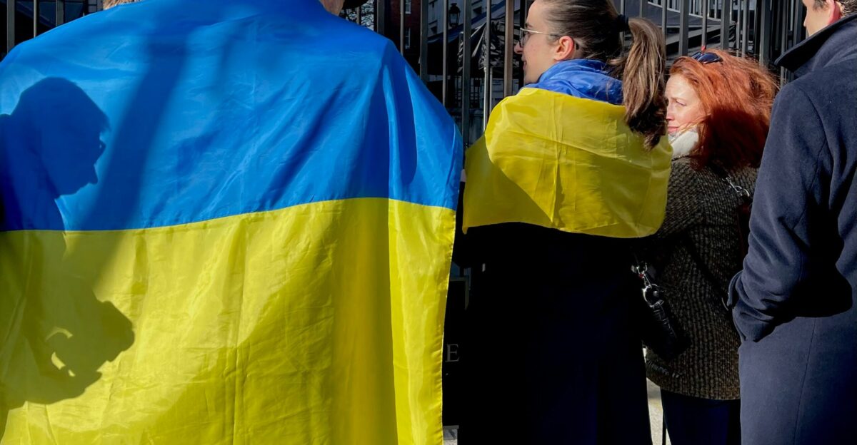 a group of people standing next to each other