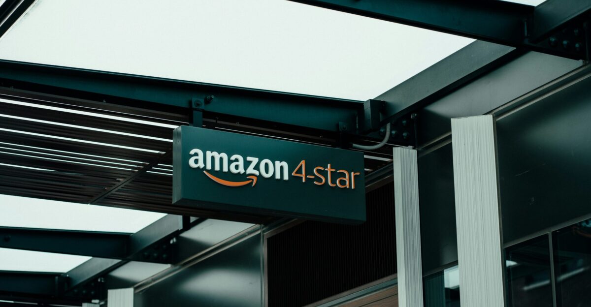 a sign hanging from the side of a building