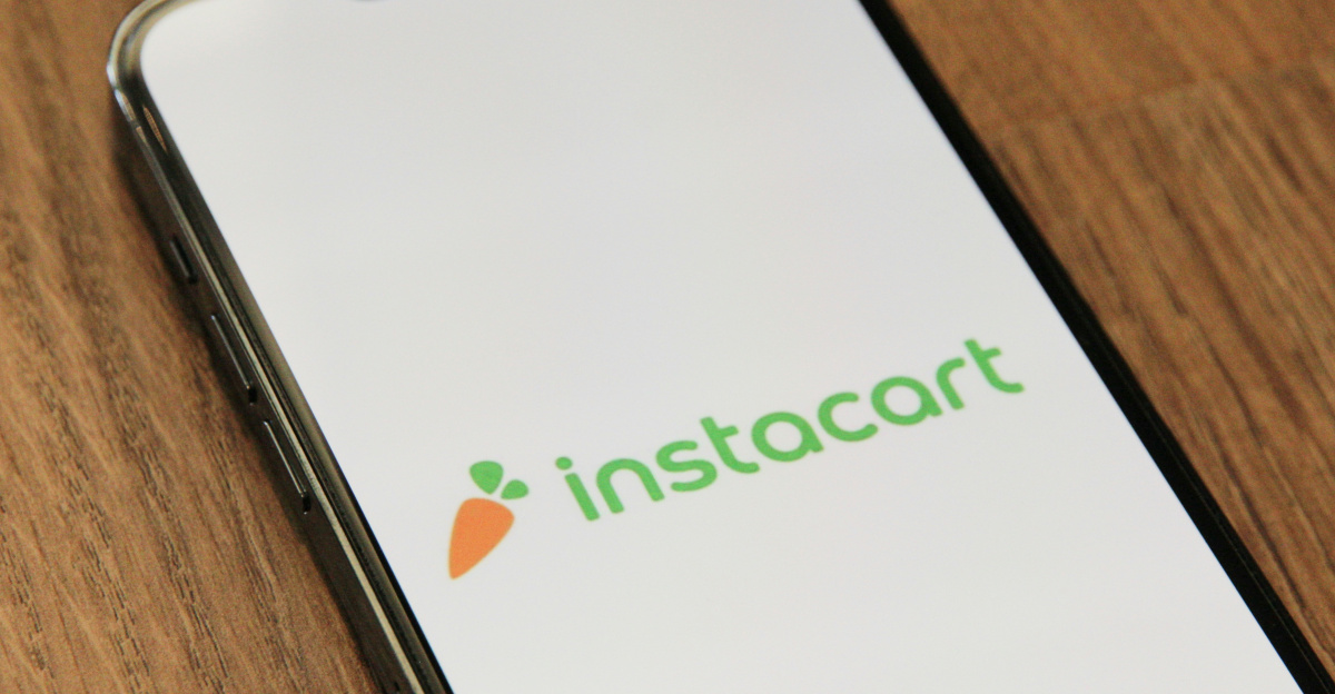 a phone with the instocart logo on it