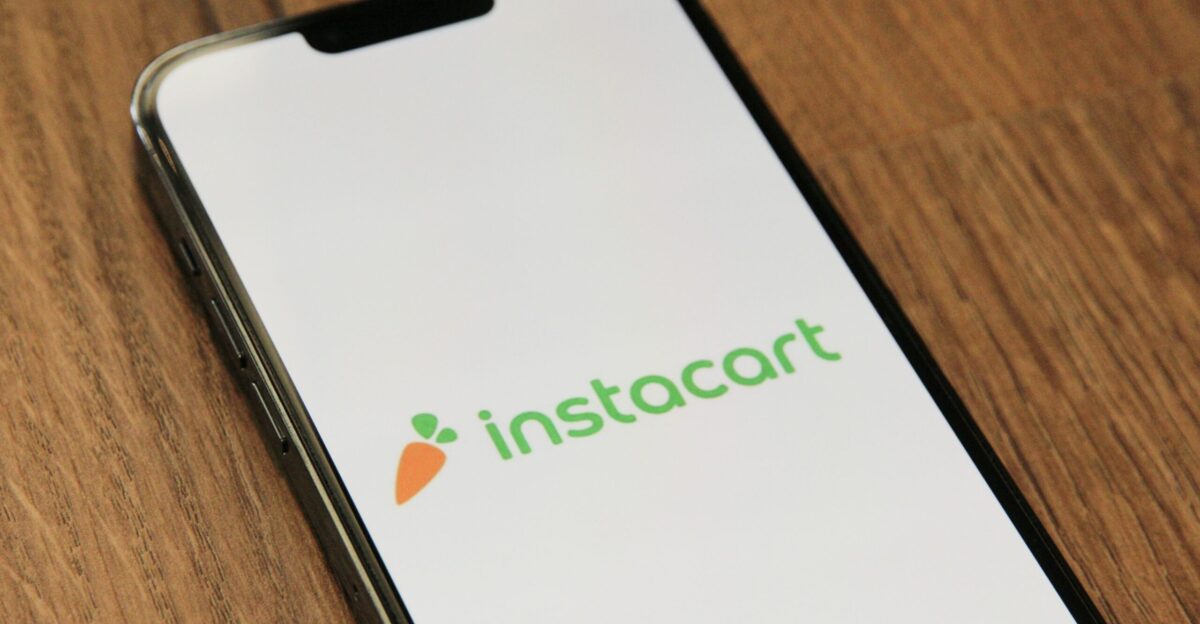 a phone with the instocart logo on it
