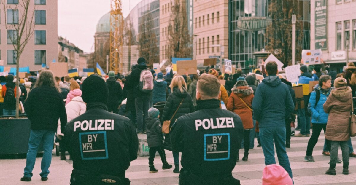 a group of police officers walking down a street