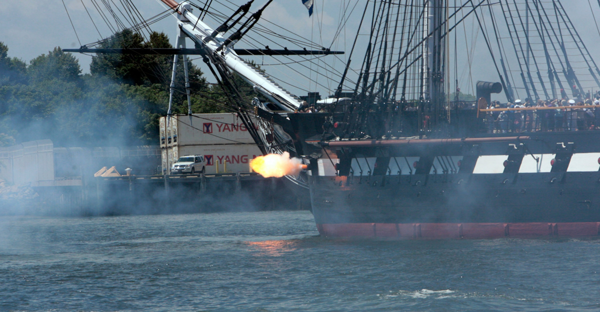 a large boat floating on top of a body of water
