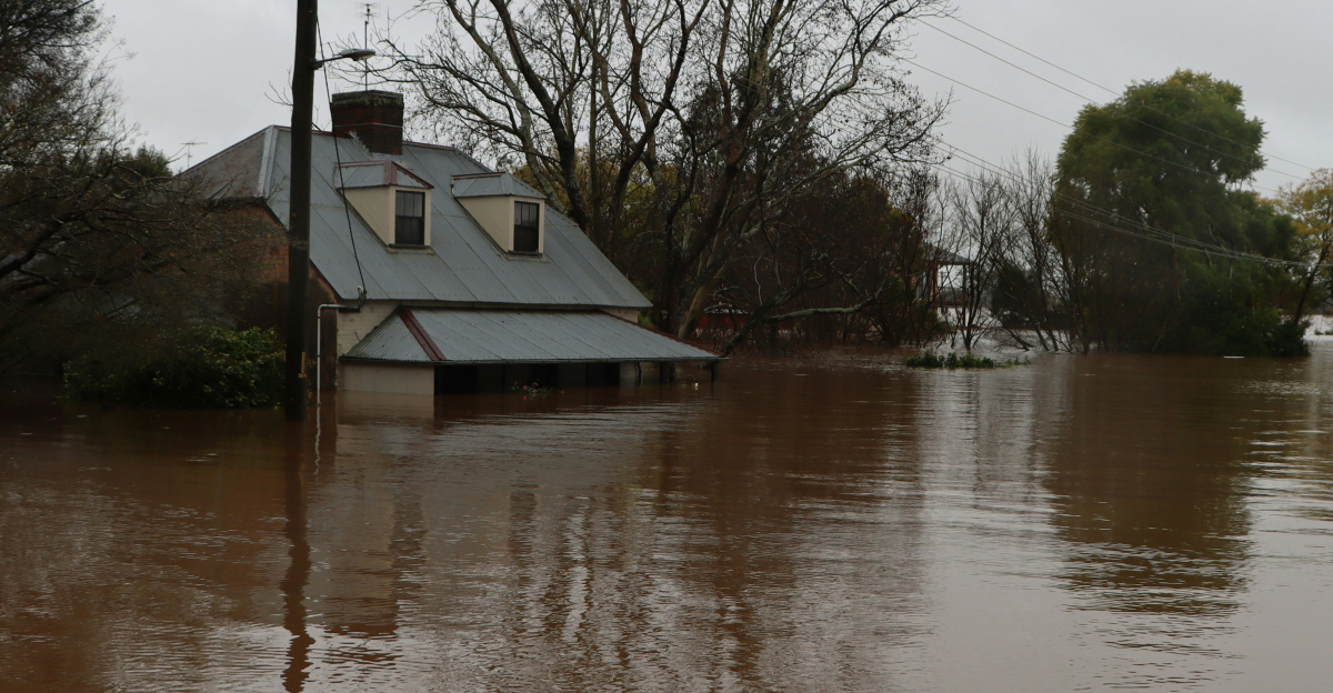 a flooded area with a house