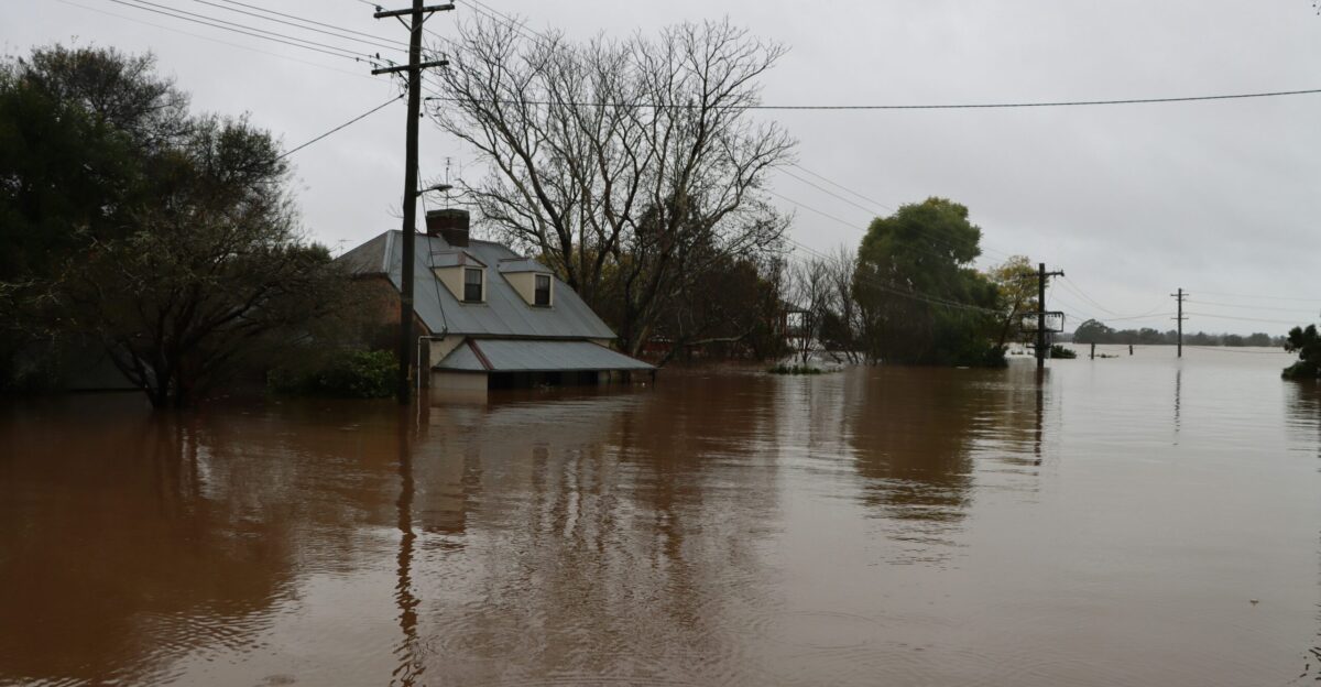 a flooded area with a house