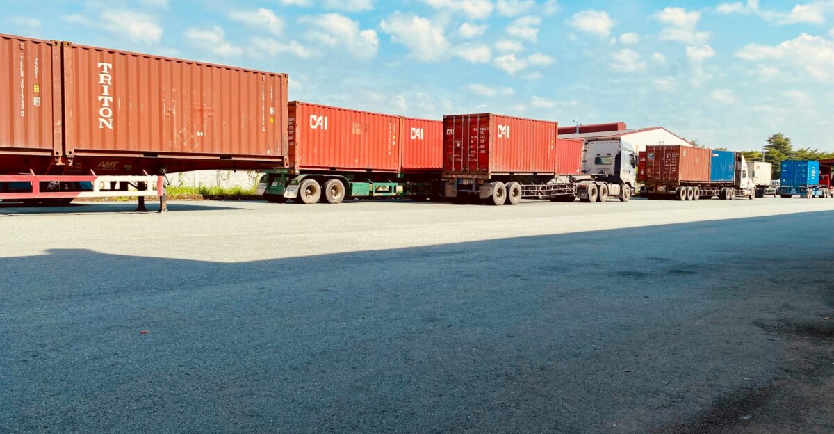 a group of containers on a trailer