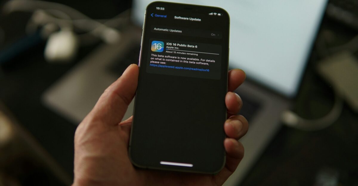 a hand holding a phone