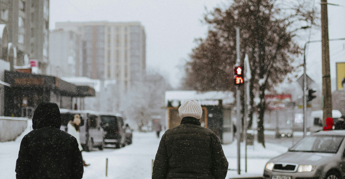 people standing in the snow