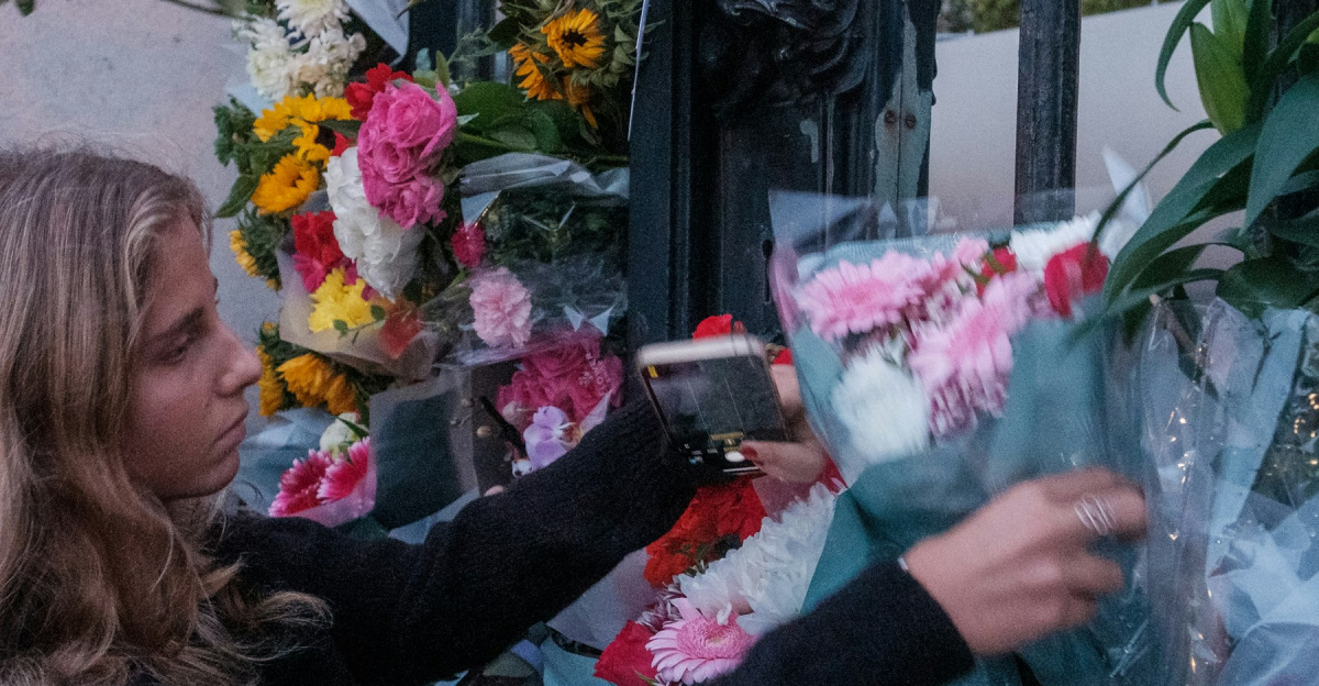 a person holding a bouquet of flowers