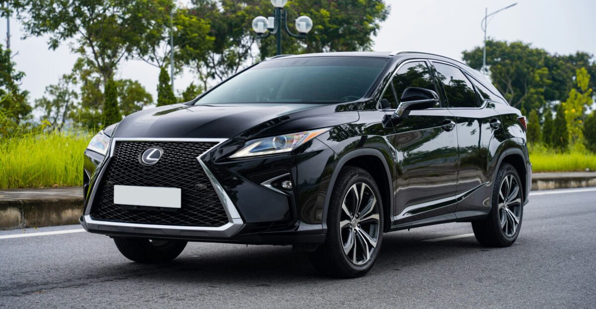 a black car parked on a road