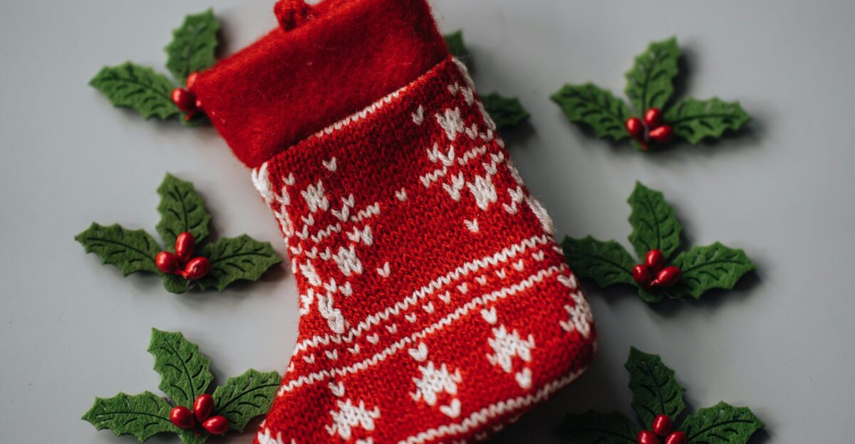 a red and white pillow with a red and white design