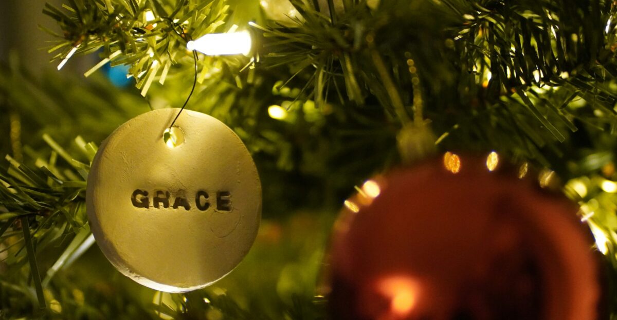 a decorated tree with a white ball
