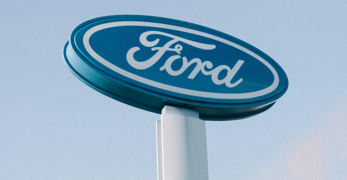 a ford sign is shown against a blue sky