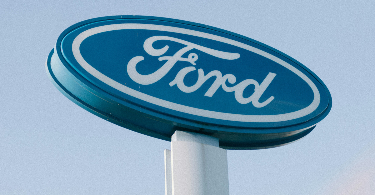 a ford sign is shown against a blue sky