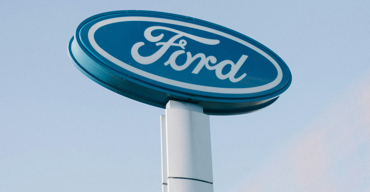 a ford sign is shown against a blue sky