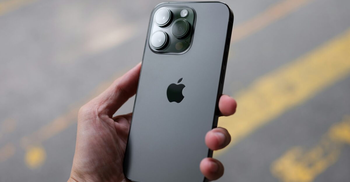a person holding an iphone in their hand