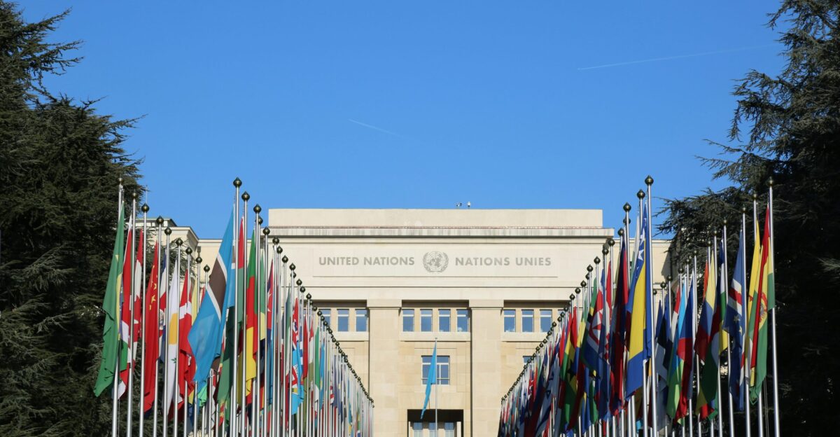 a building with a lot of flags in front of it