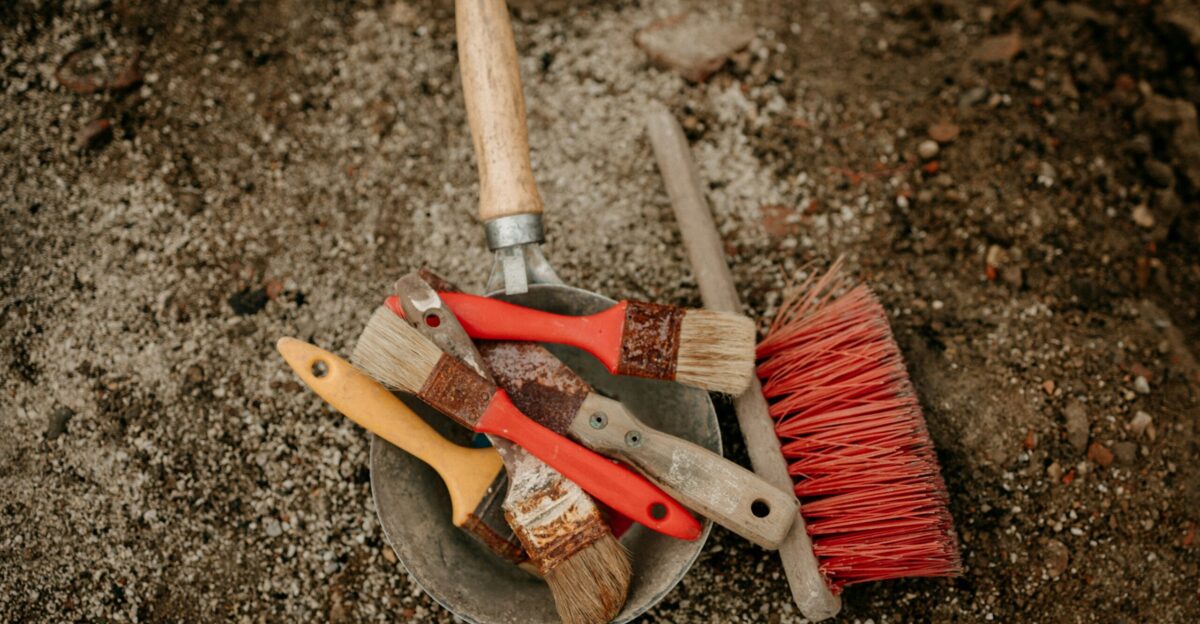 a bucket filled with different types of tools