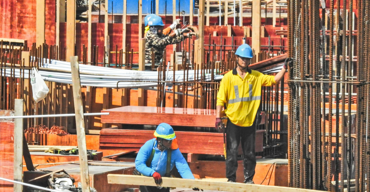 a group of men working on a construction site