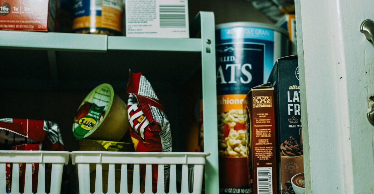 a shelf filled with lots of different types of food