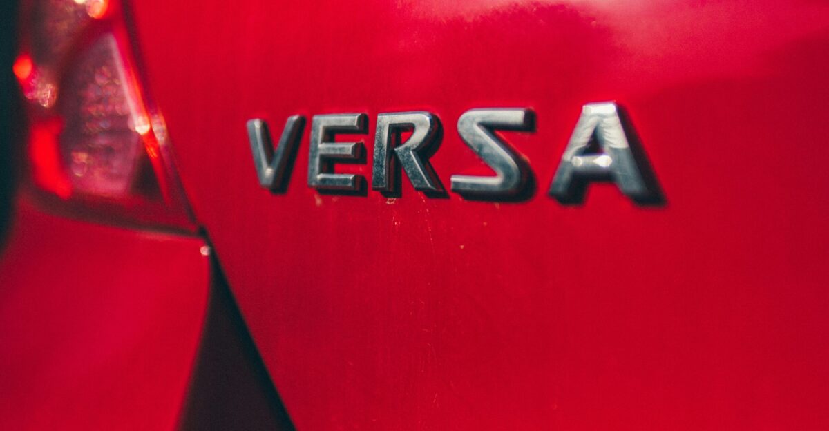 a close up of the rear end of a red car