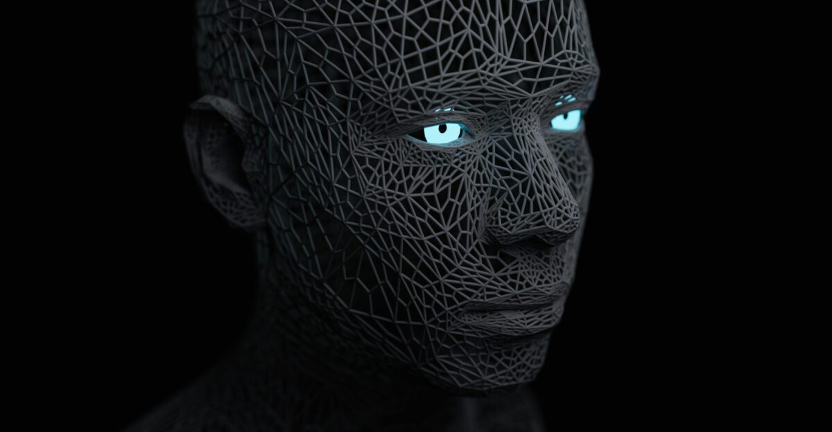 a man with blue eyes and a black background