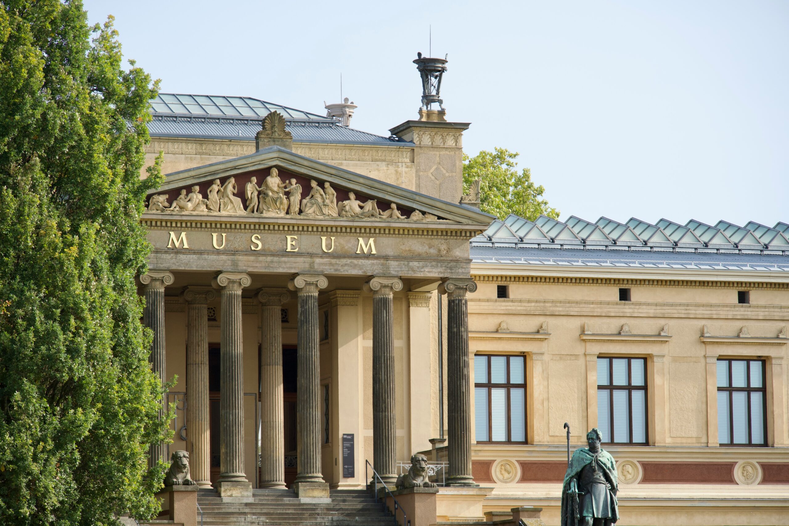 a building with a statue in front of it