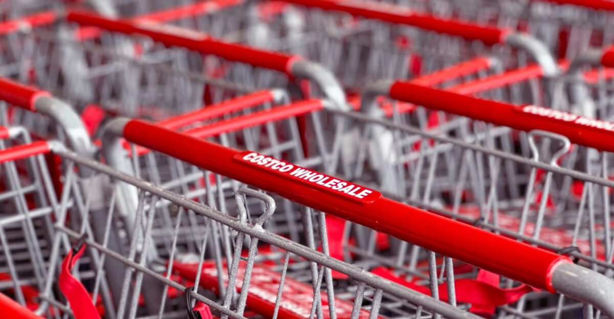 a row of red and silver shopping carts